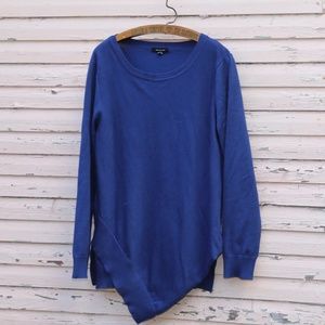 Long, blue, crew-necked sweater